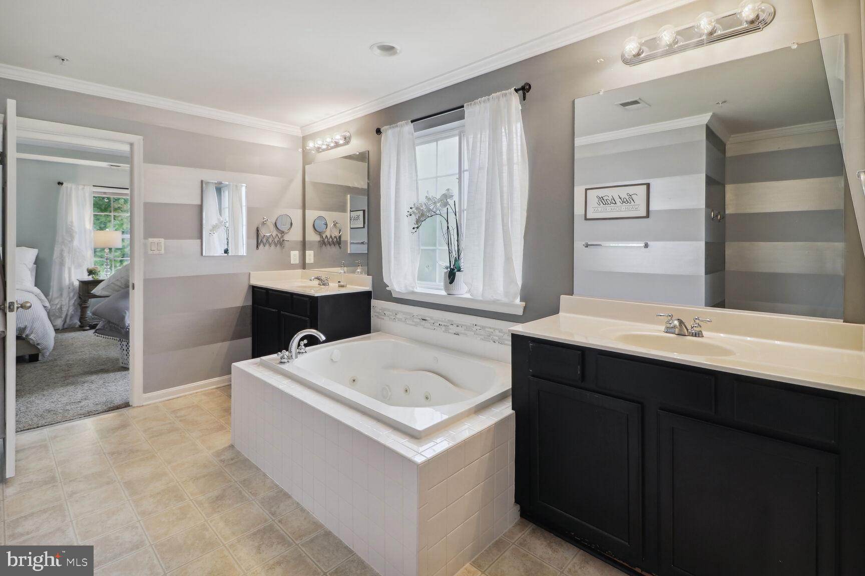 6316 Old Washington Road Elkridge, MD 21075 - Photo 24 of 47 Primary bath with dual sinks/soaking tub/shower