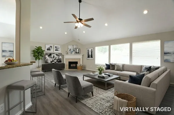 a view of a room with wooden floor