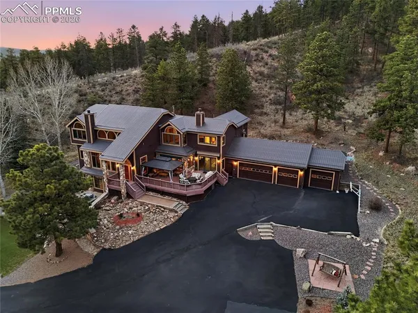 an aerial view of a house having yard