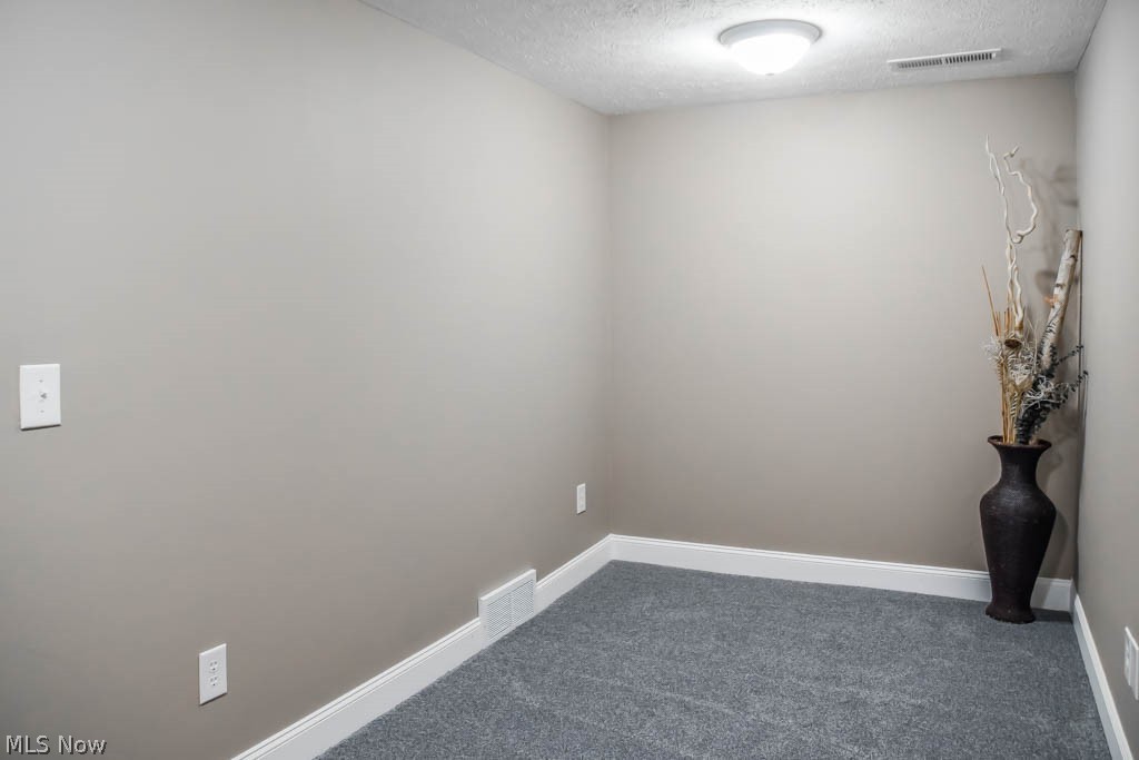 418 Everhard Road Southwest North Canton, OH 44709 - Photo 26 of 35 Bonus room on the lower level - could be an office, storage or playroom!