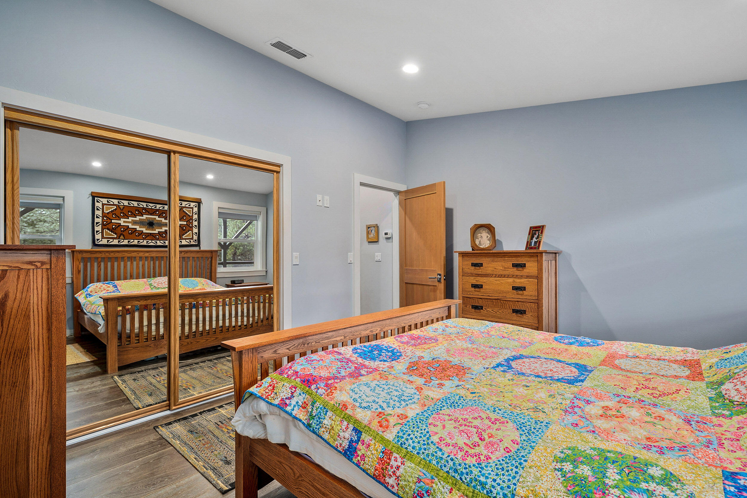 3425 Quartz Creek Road Merlin, OR 97532 - Photo 22 of 41 a bedroom with a bed and a dresser in it
