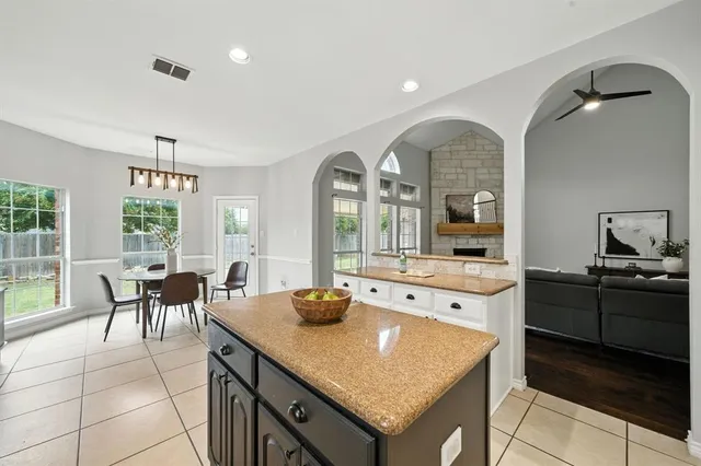 front view of a house with a large window
