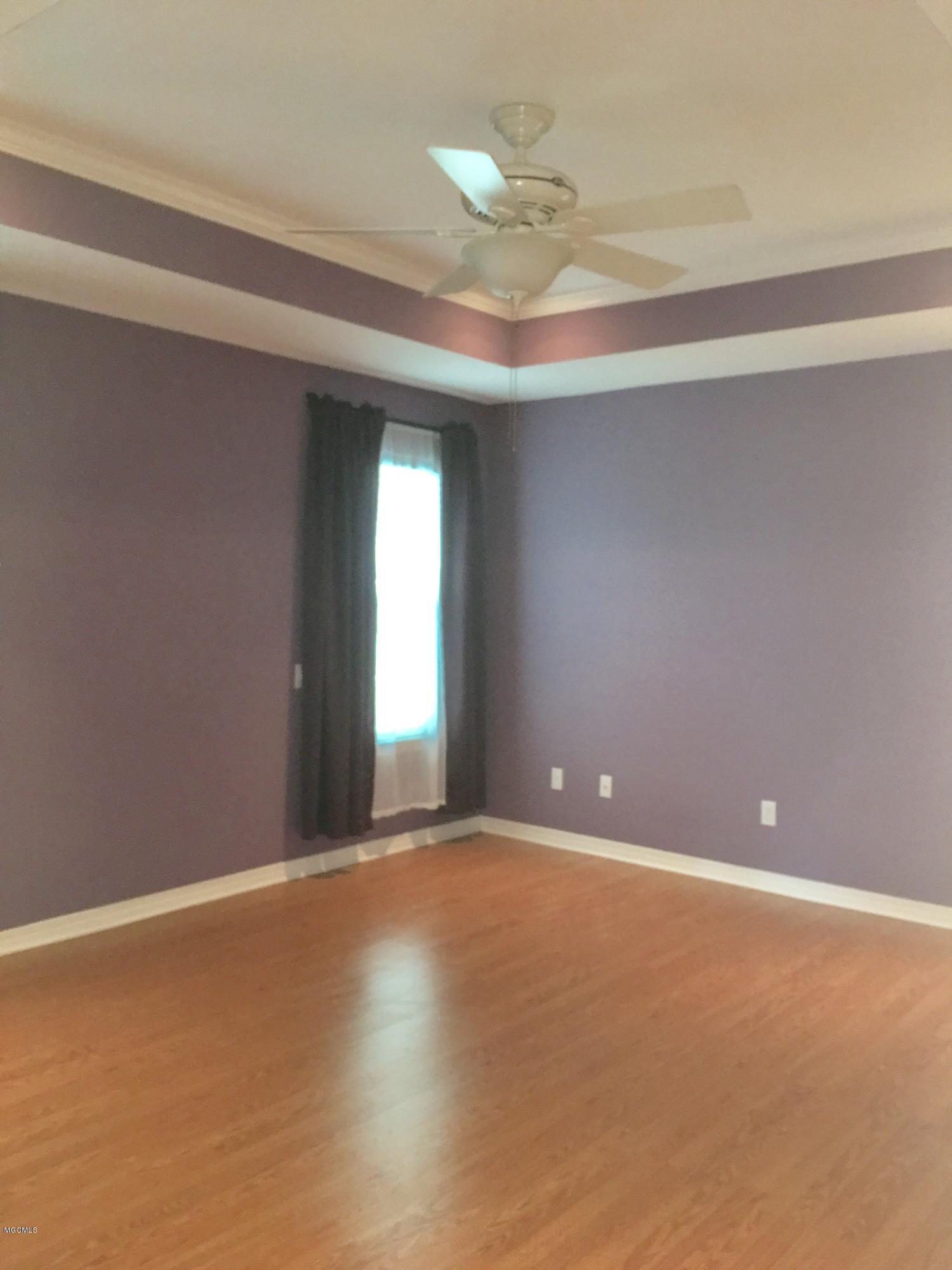 7028 Woolmarket Road Biloxi, MS 39532 - Photo 7 of 16 Master Bedroom