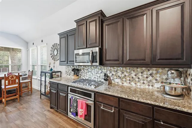 a kitchen with counter space and sink