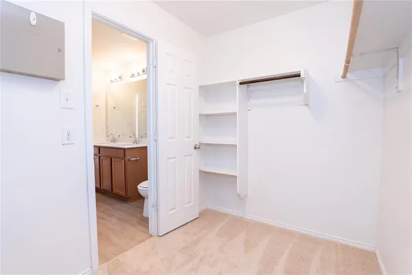 a view of kitchen and utility room
