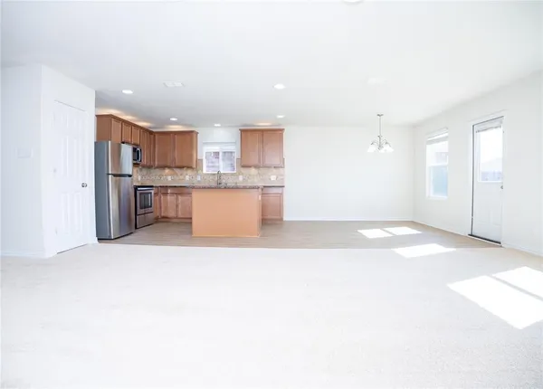 a view of kitchen and a window