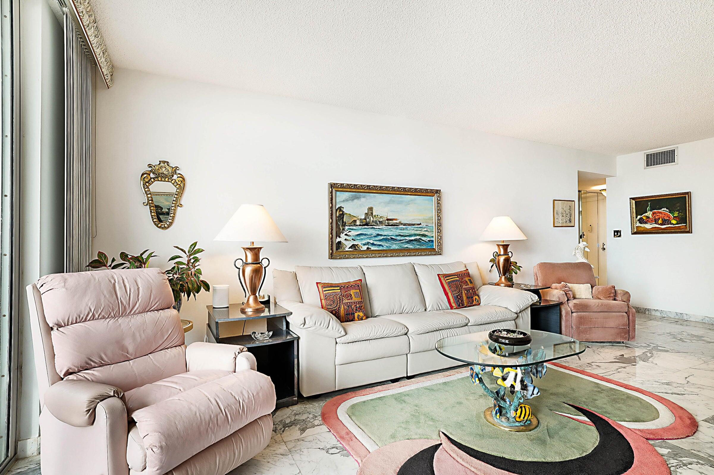 1149 Hillsboro Mile, Unit 310 Hillsboro Beach, FL 33062 - Photo 14 of 33 a living room with furniture and a wooden floor