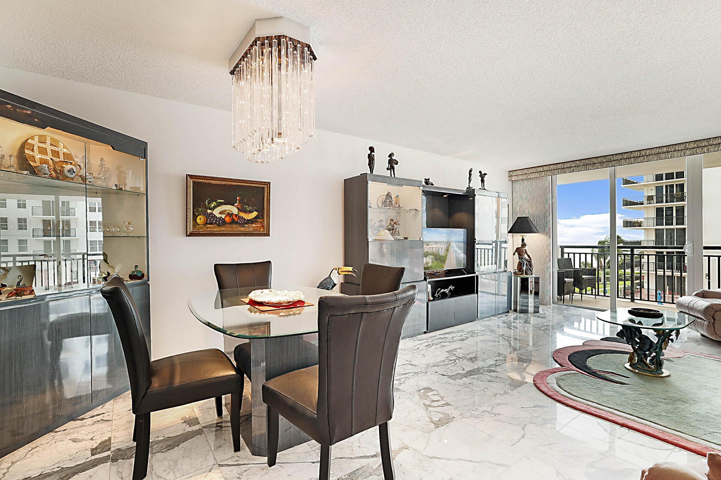 1149 Hillsboro Mile, Unit 310 Hillsboro Beach, FL 33062 - Photo 10 of 33 a dining room with furniture and window