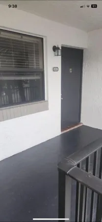 a view of a potted plants next to a house