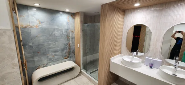 a view of a house with backyard and porch