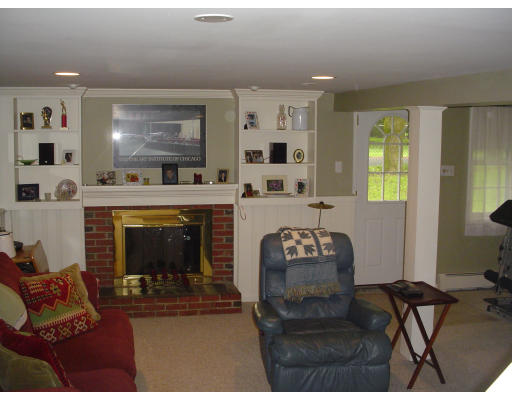 81 Albemarle Road Longmeadow, MA 01106 - Photo 12 of 16 a living room with furniture and a fireplace