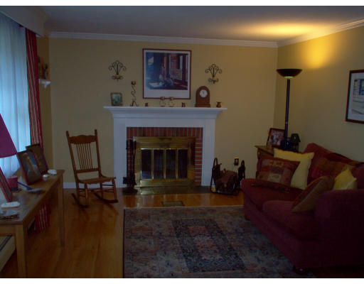 81 Albemarle Road Longmeadow, MA 01106 - Photo 2 of 16 a living room with furniture and a fireplace