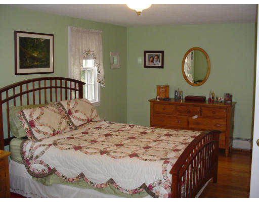 81 Albemarle Road Longmeadow, MA 01106 - Photo 9 of 16 a bedroom with a bed and a dresser