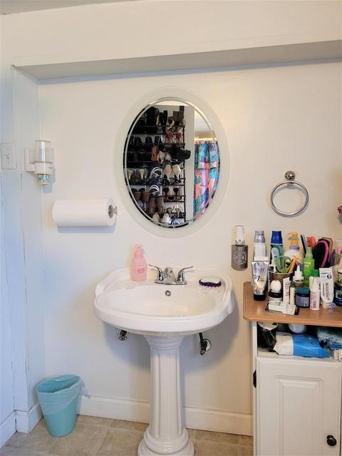 1718 Roosevelt Place Gary, IN 46404 - Photo 11 of 18 a bathroom with a sink and a mirror