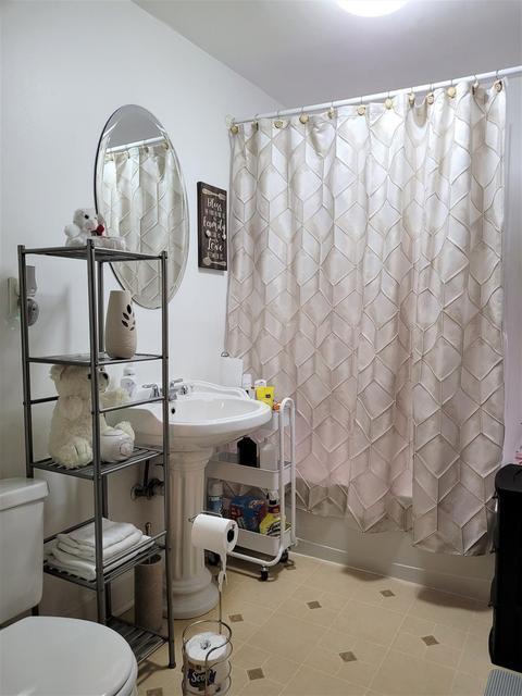 1718 Roosevelt Place Gary, IN 46404 - Photo 8 of 18 a room with chairs a table and chairs