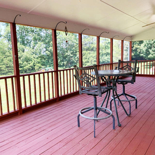 1419 Lee Ford Camp Road Ridgeway, VA 24148 - Photo 36 of 43 rear screened porch, another angle