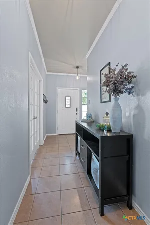a kitchen with stainless steel appliances a sink and cabinets