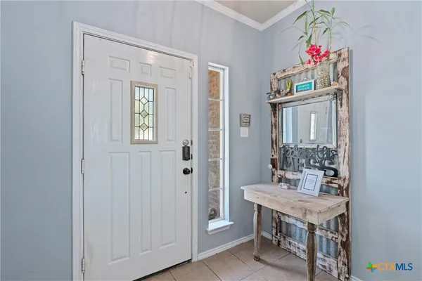 a bathroom with a sink vanity and a mirror