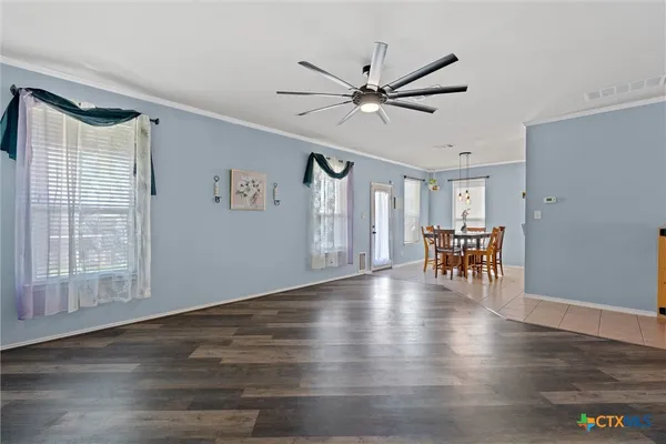 a view of livingroom and hardwood floor
