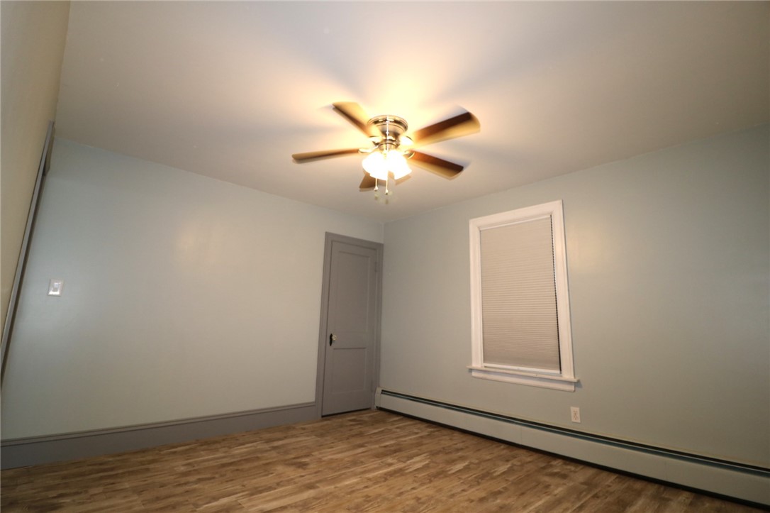 125 Inman Road Burrillville, RI 02830 - Photo 21 of 50 1st bedroom on main level. 11' 3" x 12' 4"