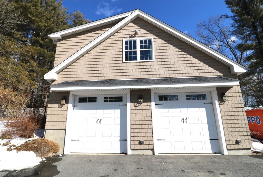 125 Inman Road Burrillville, RI 02830 - Photo 49 of 50 Enormous 40' L x 30' W. Comes with a 9000 lb car lift and a 1344 sq. ft. unfinished loft above.