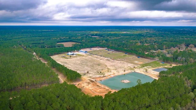 a view of a lake with a yard