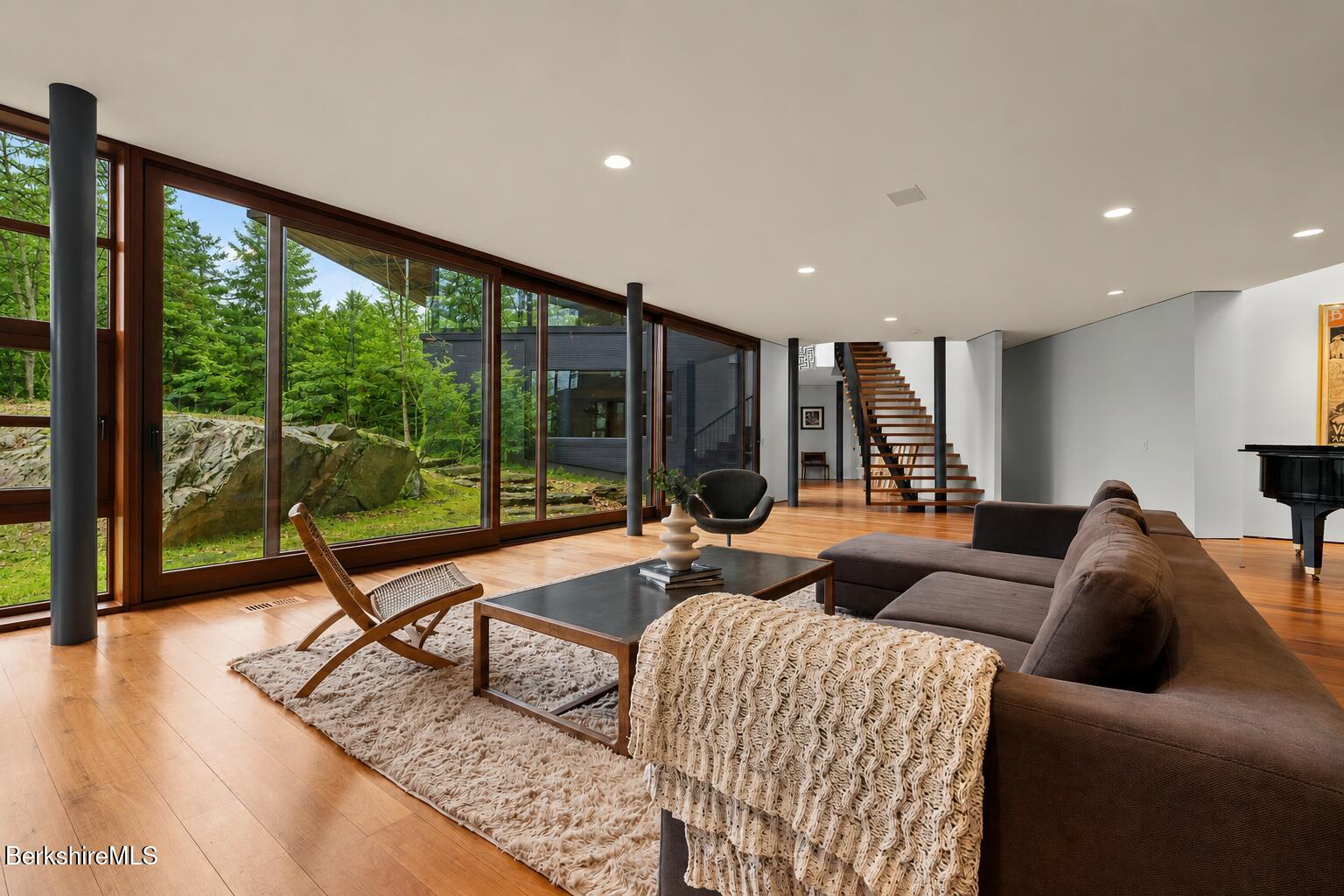 250 Long Pond Road Great Barrington, MA 01230 - Photo 32 of 56 a living room with furniture and a large window