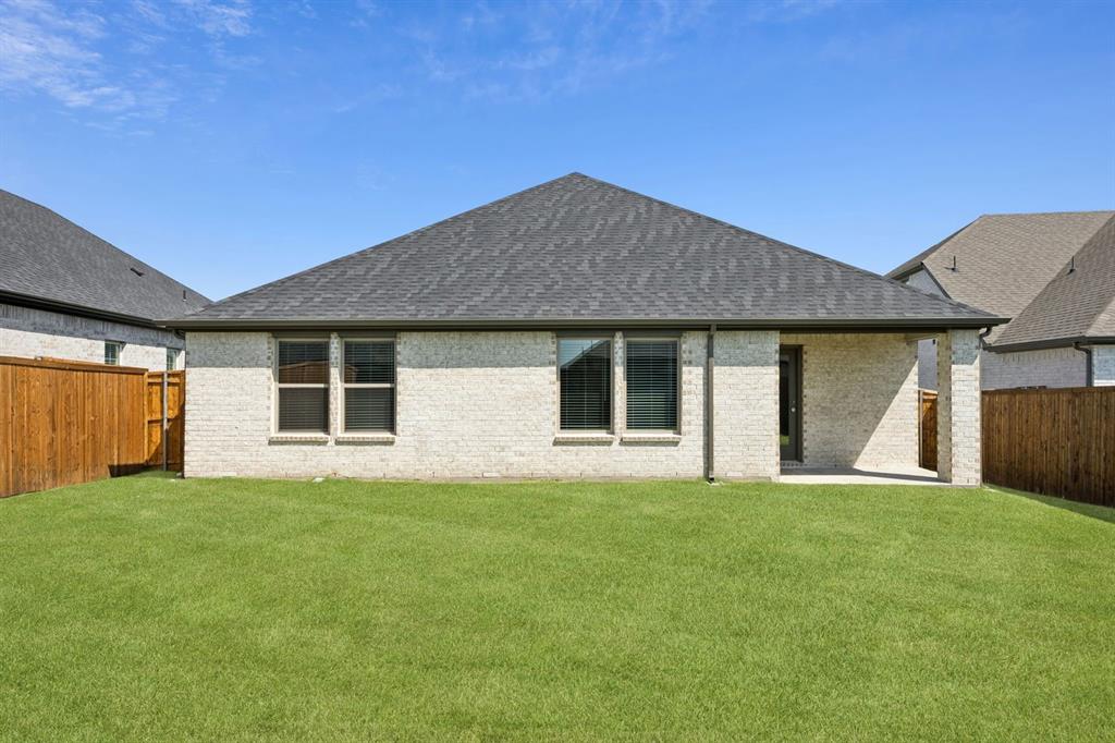 5721 Rushing River Way McKinney, TX 75071 - Photo 27 of 29 Covered Patio in the Heisman home plan by Trophy Signature Homes – REPRESENTATIVE PHOTO