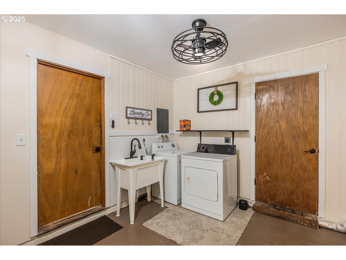 2604 Southeast 176th Place Portland, OR 97236 - Photo 16 of 27 a kitchen with a sink and a stove top oven