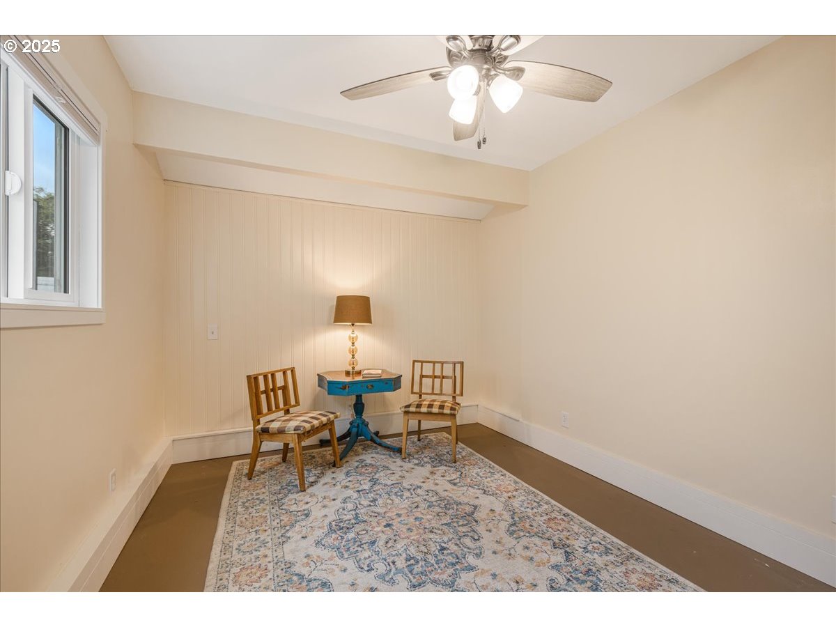 2604 Southeast 176th Place Portland, OR 97236 - Photo 20 of 27 a view of a livingroom with furniture and chandelier fan