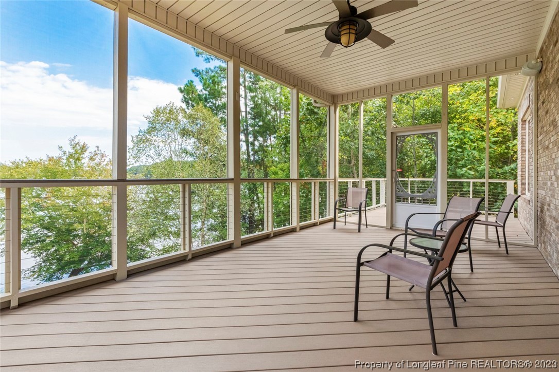 4 The Pointe Sanford, NC 27332 - Photo 13 of 50 a view of a chairs and table in patio with a yard