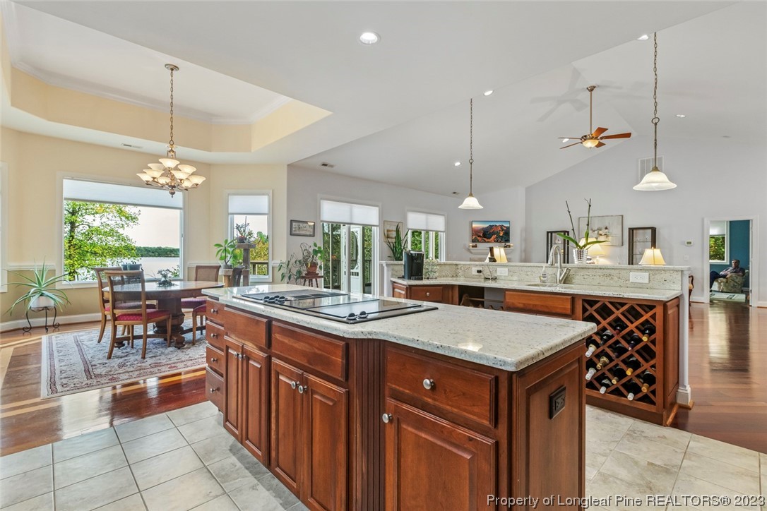 4 The Pointe Sanford, NC 27332 - Photo 20 of 50 a kitchen with granite countertop a sink a counter top space appliances and cabinets