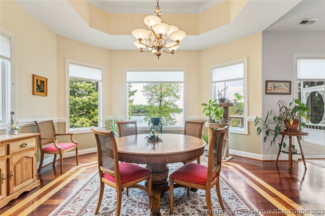 4 The Pointe Sanford, NC 27332 - Photo 22 of 50 a view of a dining room with furniture window and wooden floor