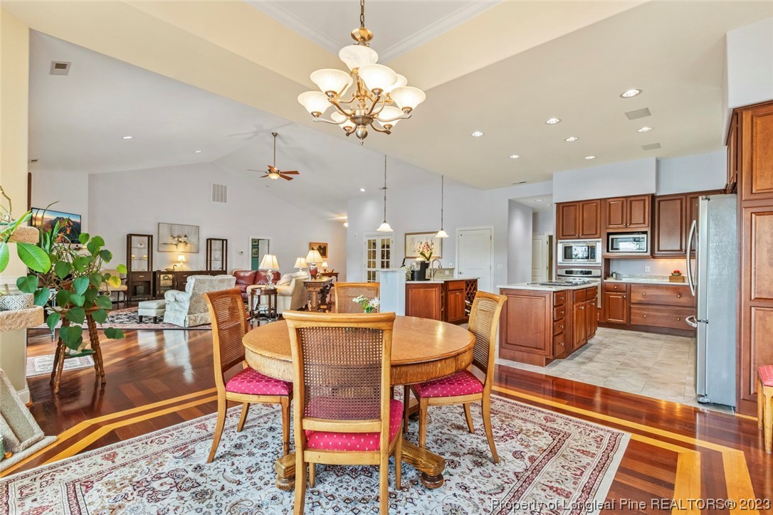 4 The Pointe Sanford, NC 27332 - Photo 23 of 50 a living room with dining room and wooden floor