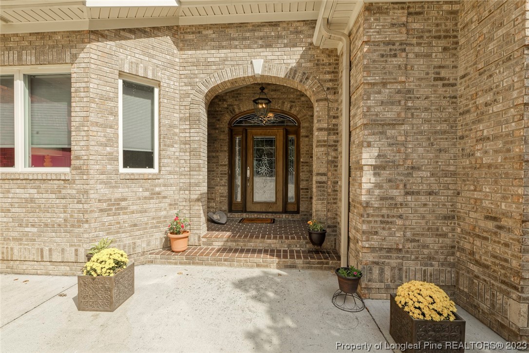 4 The Pointe Sanford, NC 27332 - Photo 3 of 50 a front view of a house with outdoor seating