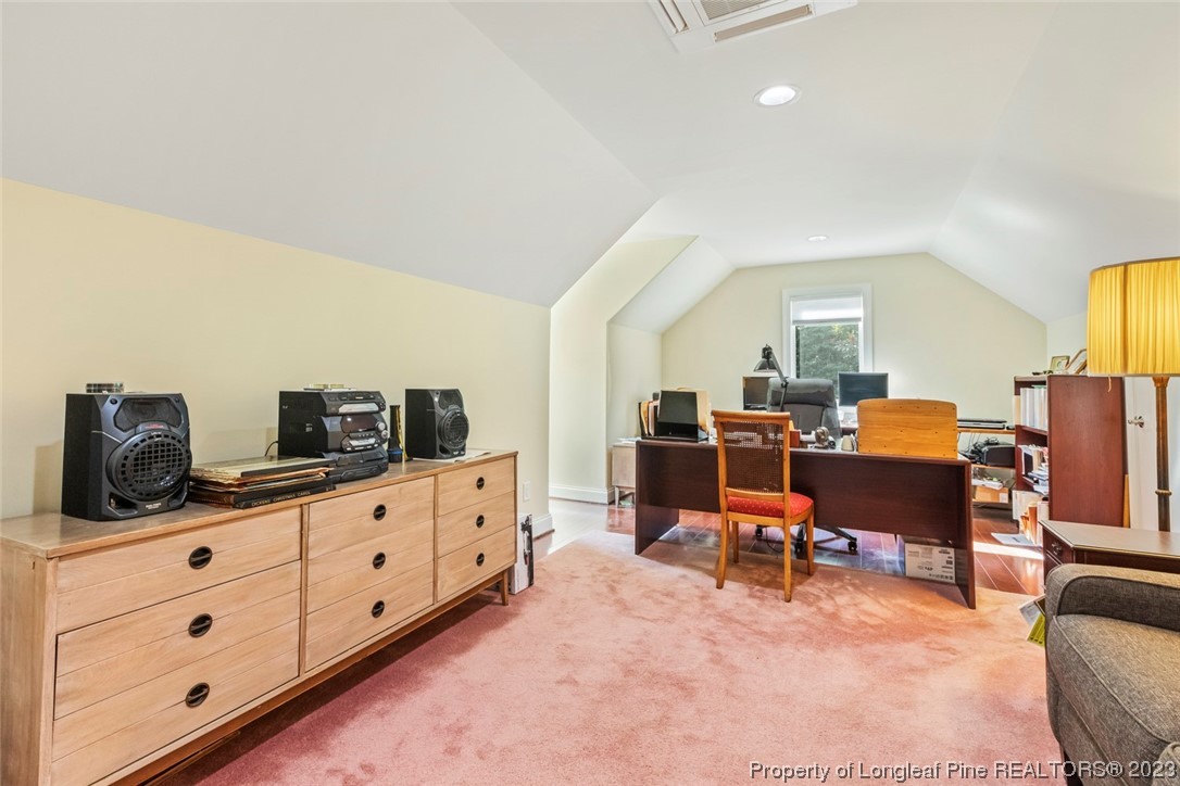 4 The Pointe Sanford, NC 27332 - Photo 32 of 50 a room with furniture and a flat screen tv