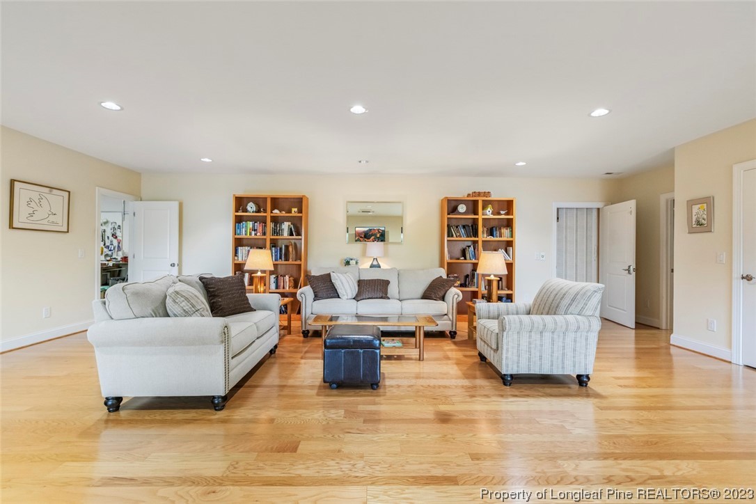 4 The Pointe Sanford, NC 27332 - Photo 33 of 50 a living room with furniture and wooden floor