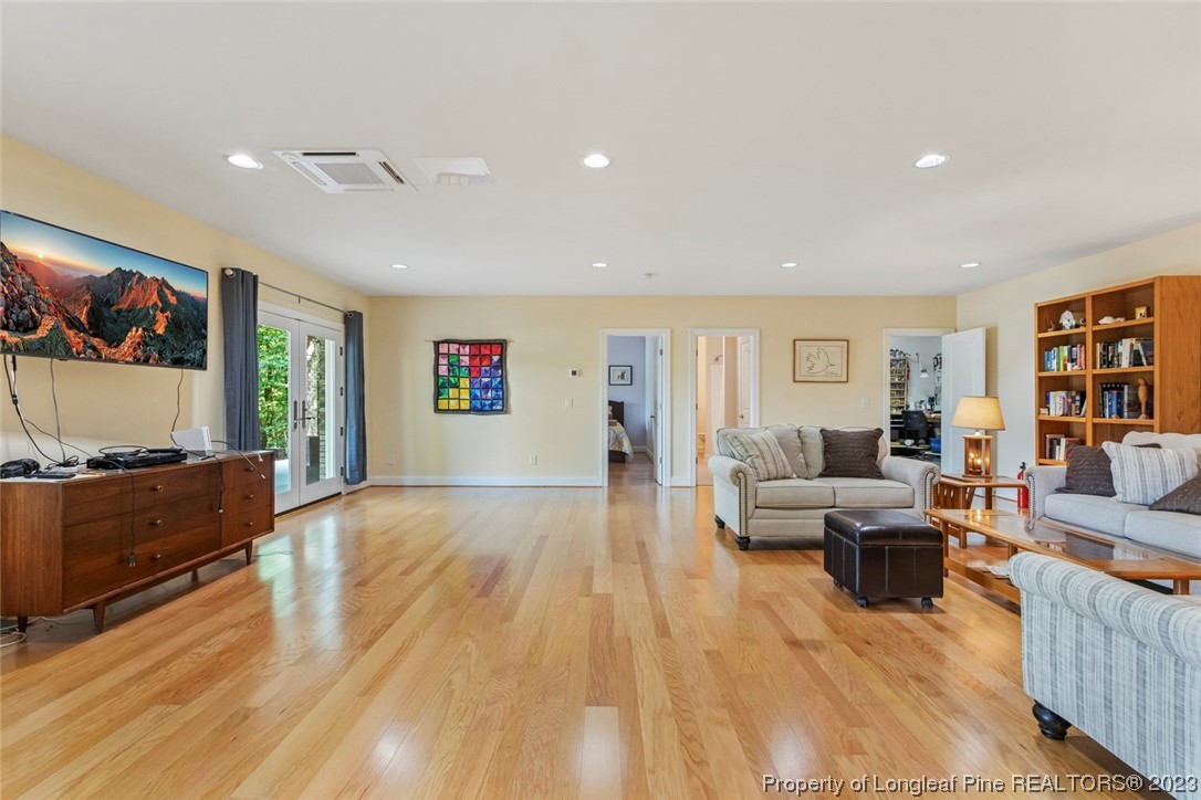 4 The Pointe Sanford, NC 27332 - Photo 34 of 50 a living room with furniture and a flat screen tv