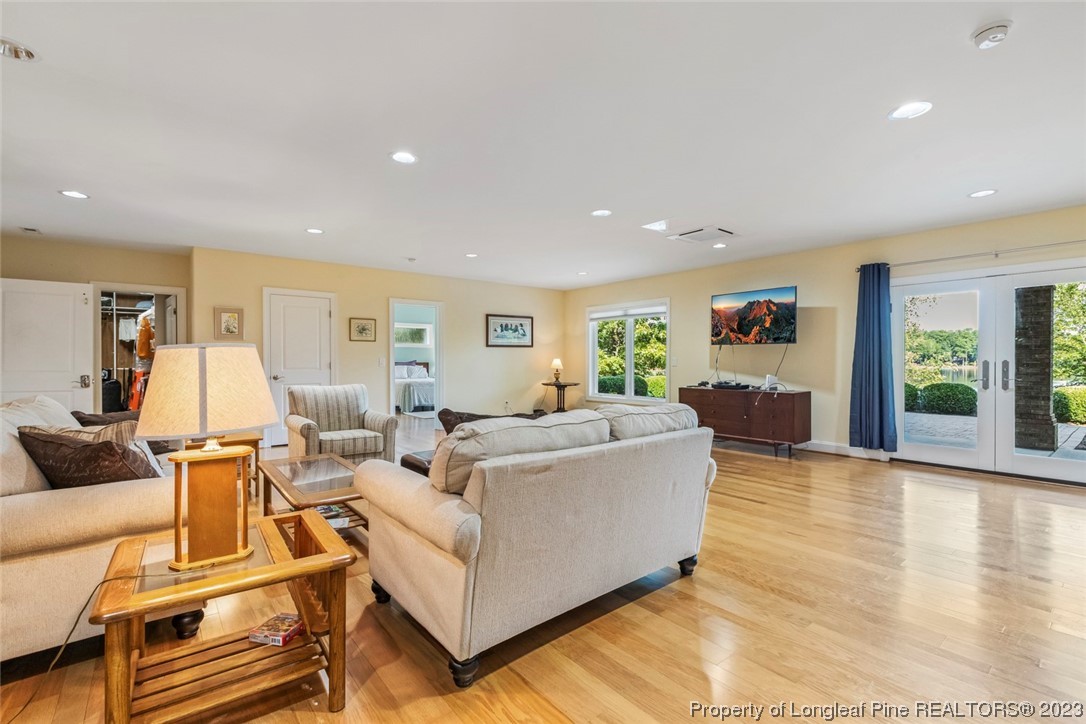 4 The Pointe Sanford, NC 27332 - Photo 35 of 50 a living room with furniture and a wooden floor