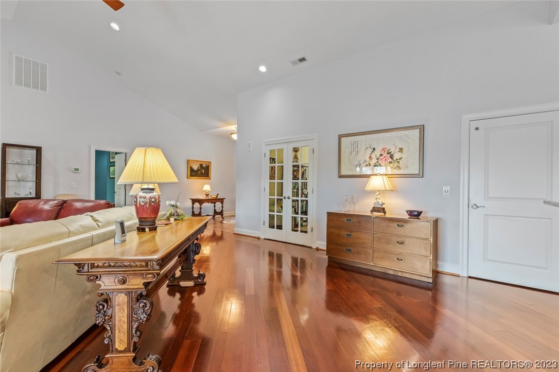 4 The Pointe Sanford, NC 27332 - Photo 8 of 50 a living room with furniture and a wooden floor