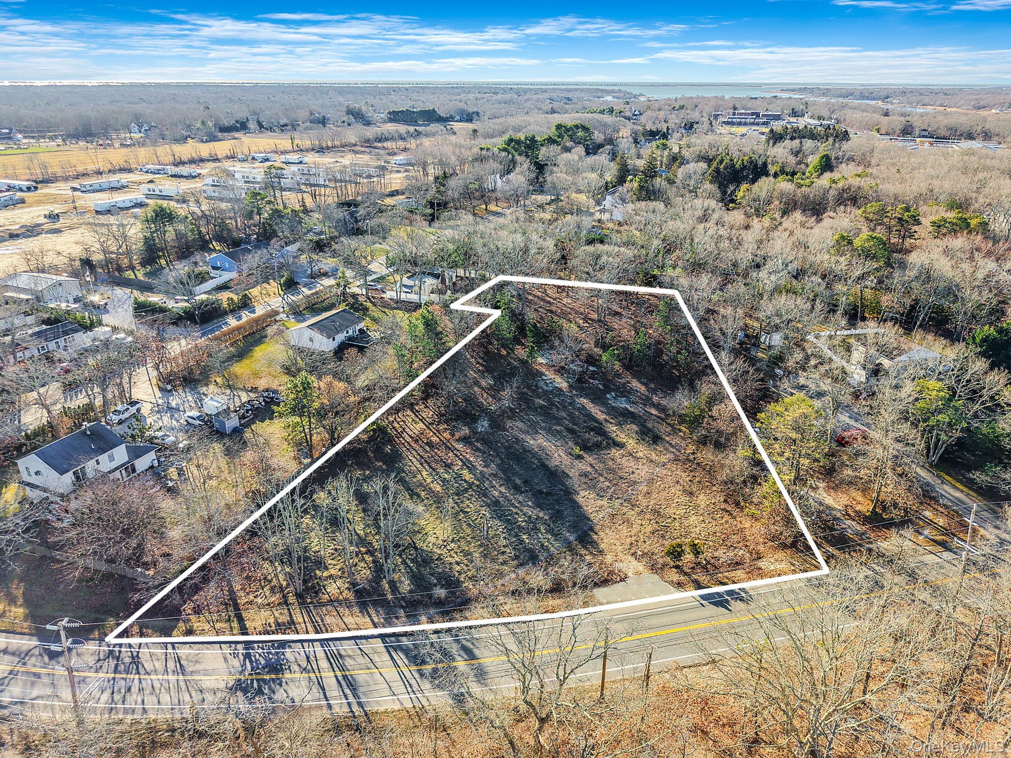 267 Old Country Road Eastport, NY 11941 - Photo 14 of 17 Aerial view of property's location featuring property boundaries highlighted