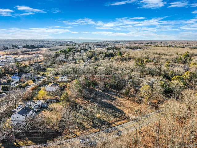 an aerial view of residential building and green space