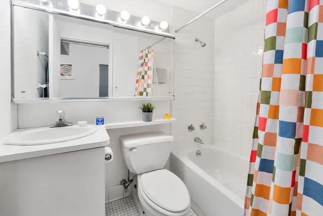 a kitchen with stainless steel appliances granite countertop a stove and a refrigerator