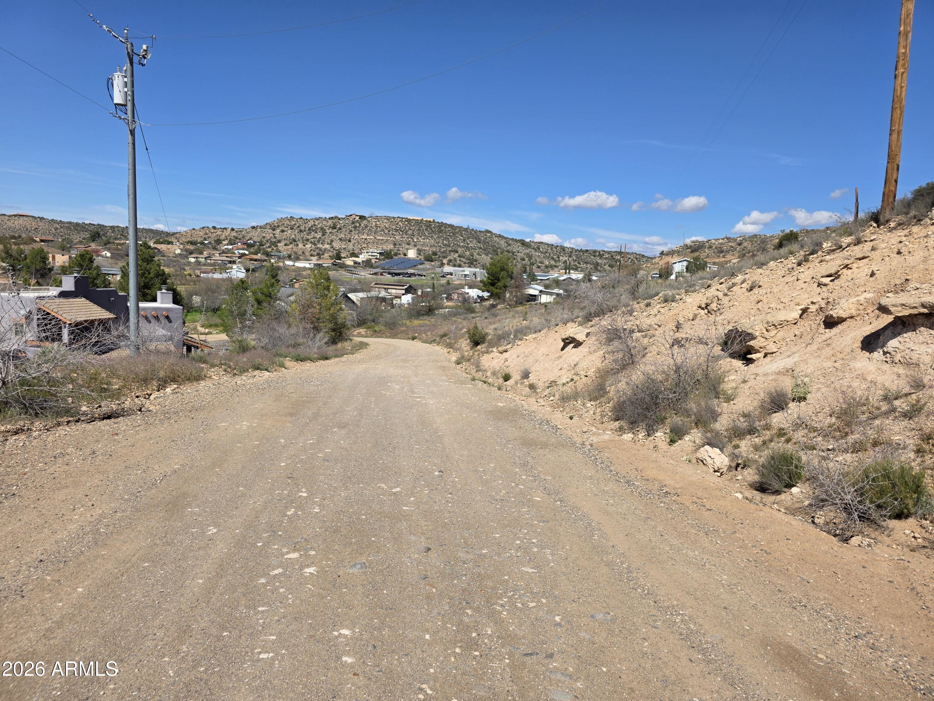 4870 East Goss Road, Unit 684 Rimrock, AZ 86335 - Photo 6 of 8 a view of a road from a terrace