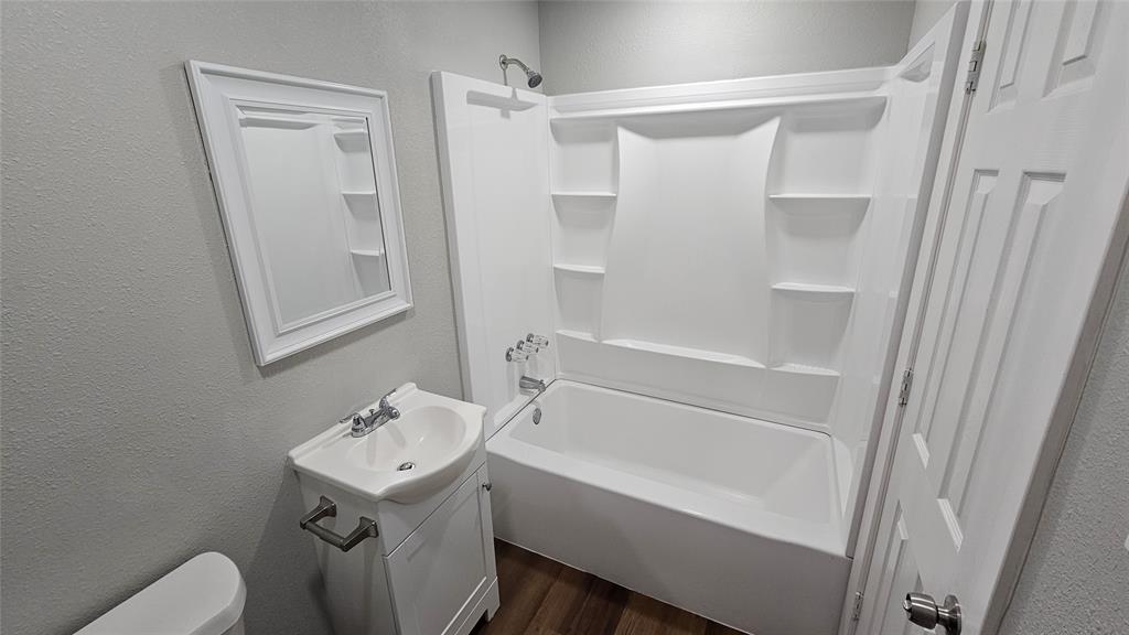 5604 Oak Grove Road Fort Worth, TX 76134 - Photo 12 of 17 Bathroom 1