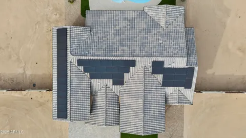 a view of a house with a sink and a yard