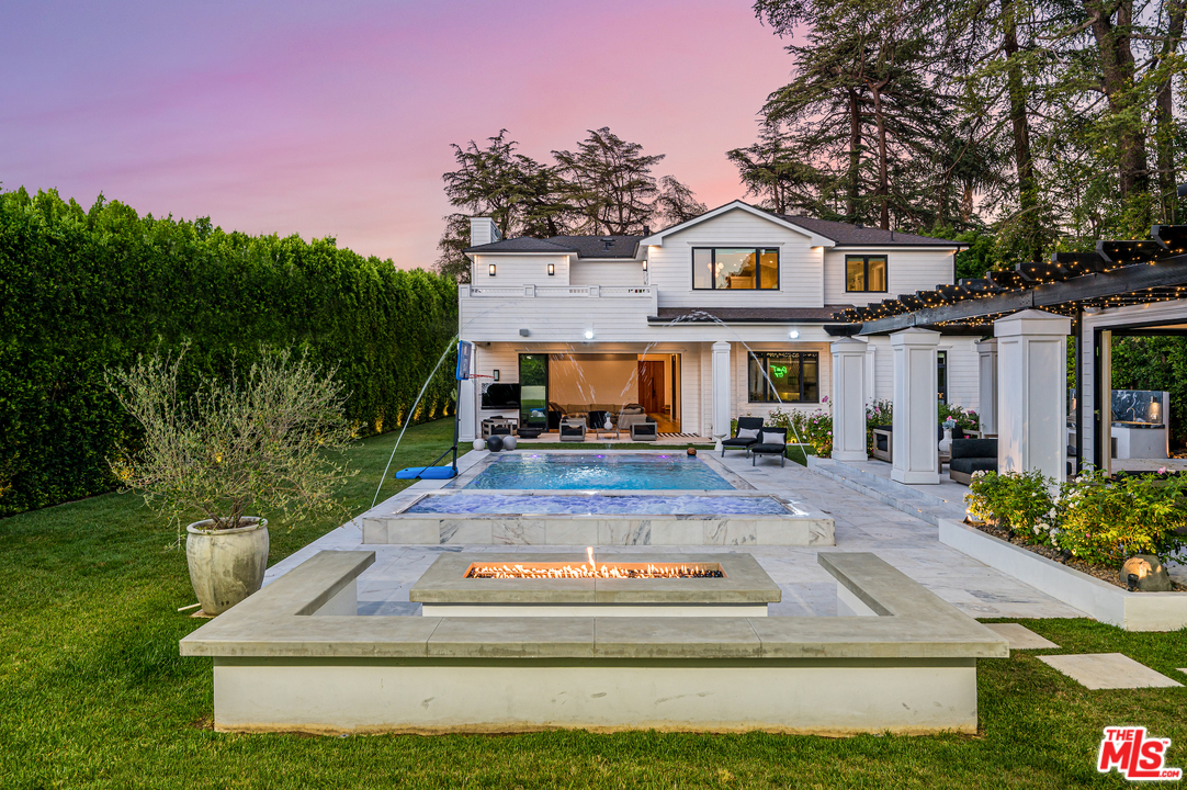4421 Haskell Avenue Encino, CA 91436 - Photo 2 of 32 a front view of a house with garden