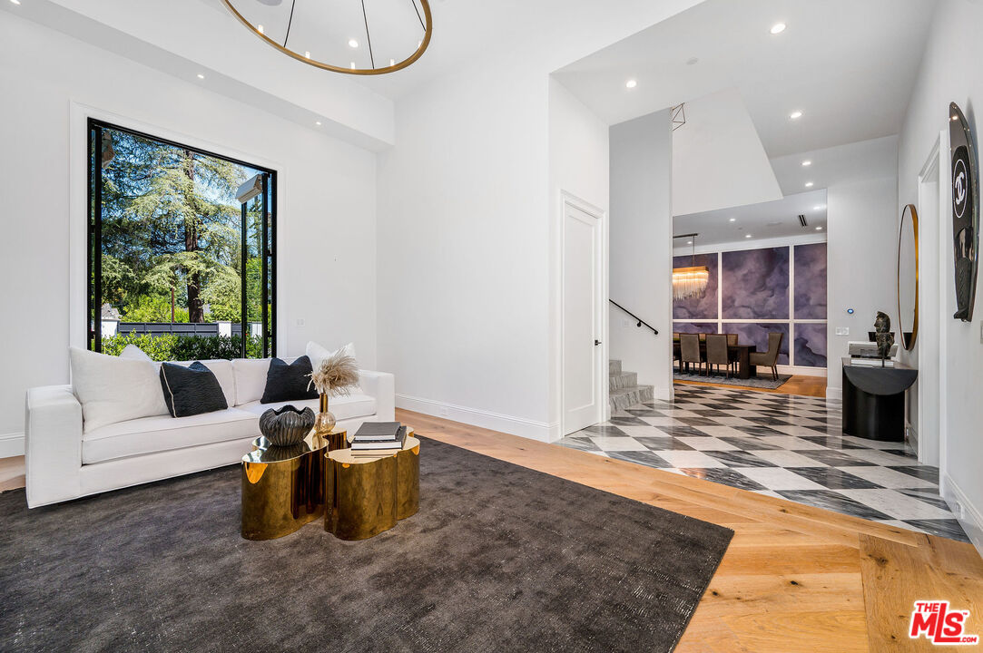 4421 Haskell Avenue Encino, CA 91436 - Photo 6 of 32 a living room with furniture