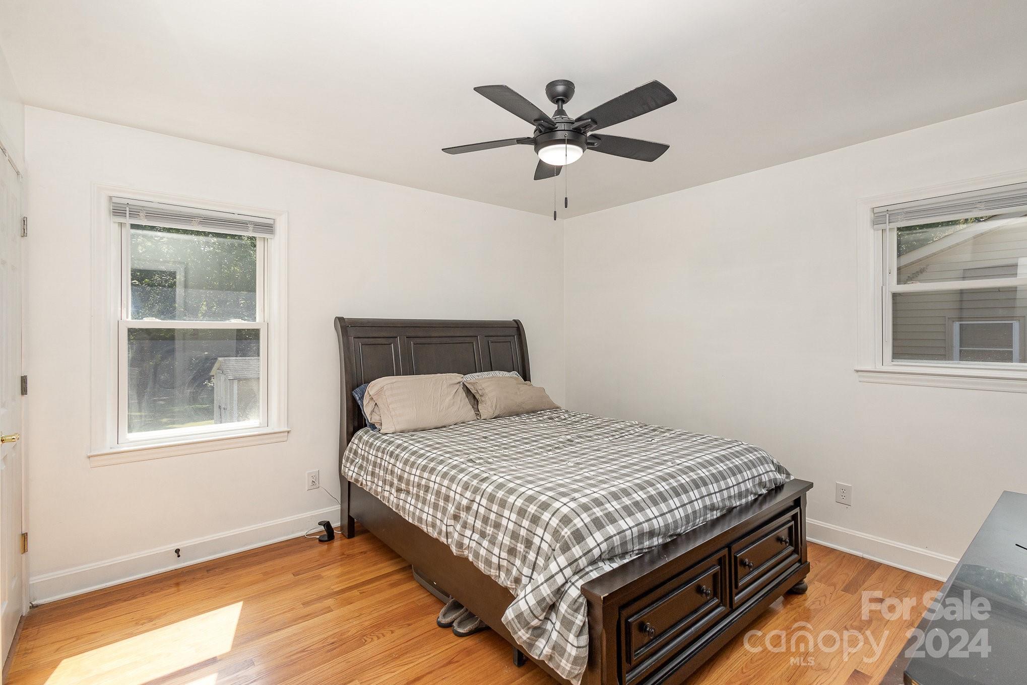 4431 Westridge Drive Charlotte, NC 28208 - Photo 12 of 24 a bedroom with a bed and window