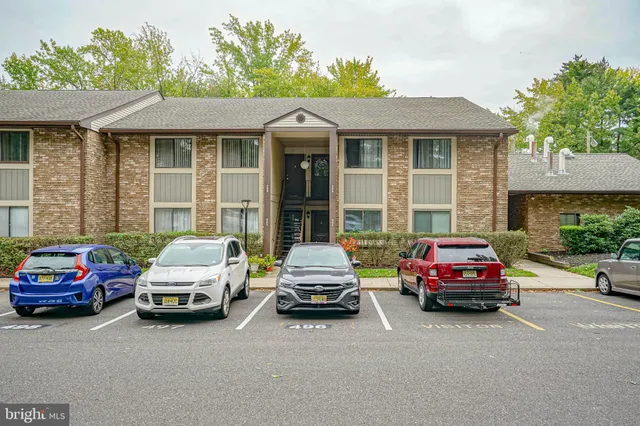 a car parked in front of a house